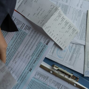 Man sitting filling out taxes