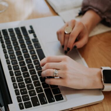freelance writer working on laptop