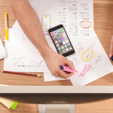 person doing paper work at an office