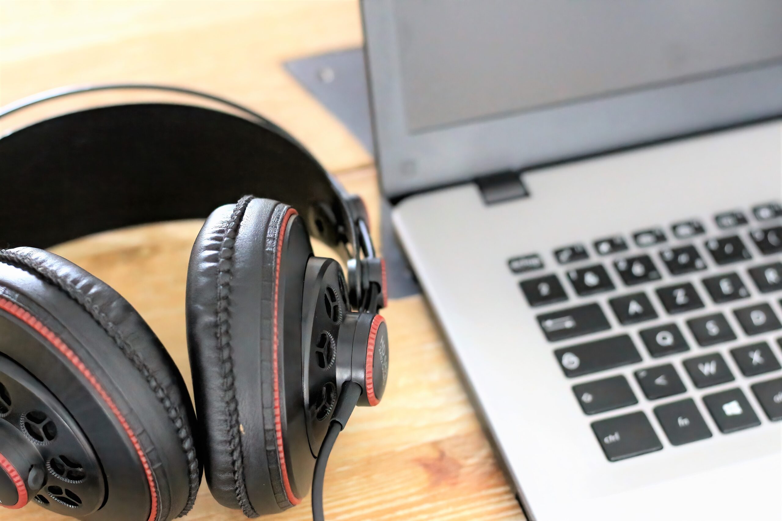 Headphones and laptop sitting on table