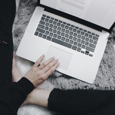 person working on laptop from home
