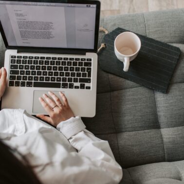 freelance writer working on laptop