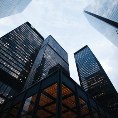 Low angle photo of tall city buildings